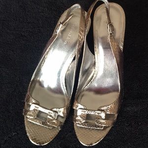 These silver Calvin Klein’s are great for parties or jeans. Snakeskin 4” heels